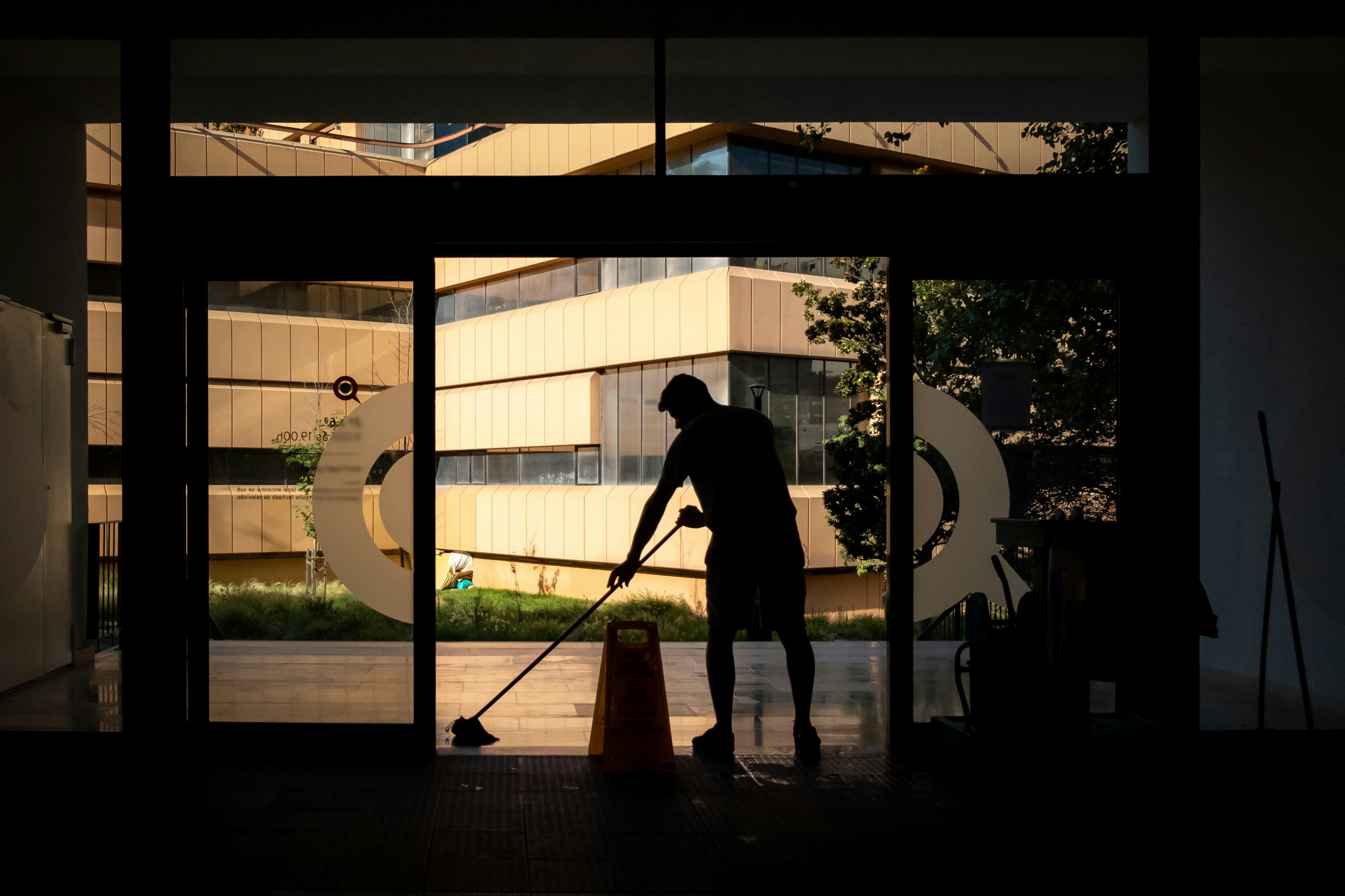 Cleaner preparing an empty flat for handover